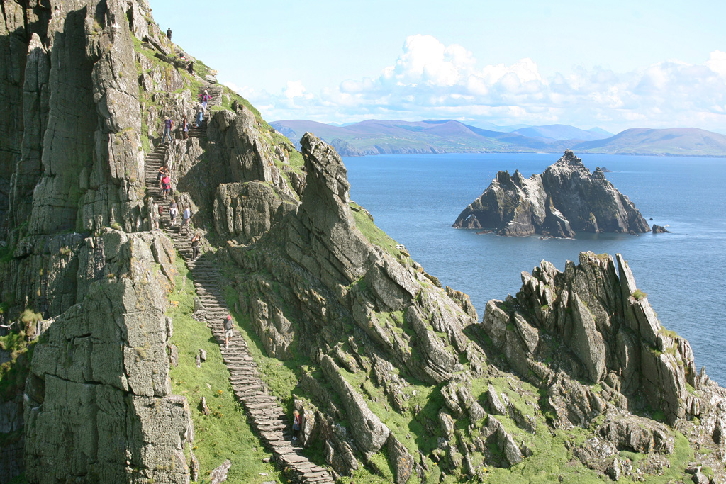 Skellig Michael Monastic Island, Co. Kerry, Ireland.    Tourists on steps to main monastic site.